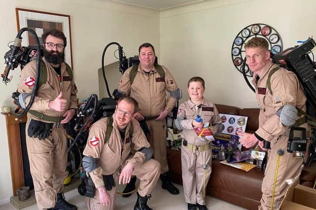Pictured is the East Midlands Ghostbusters with George. Photo: The East Midlands Ghostbusters