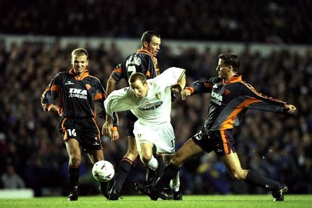 Lee Bowyer of bursts through the AS Roma defence during the UEFA Cup second round second leg match clash Elland Road in November 1998.. The game ended 0-0 with AS Roma going through 1-0 on aggregate.