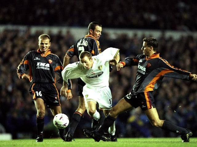 Lee Bowyer of bursts through the AS Roma defence during the UEFA Cup second round second leg match clash Elland Road in November 1998.. The game ended 0-0 with AS Roma going through 1-0 on aggregate.