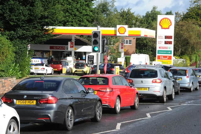 For the first time in history, to fill an average family car in Leeds with petrol will now set you back over £100. Photo: Steve Riding
