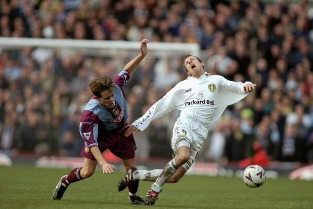 Aston Villa's Lee Hendrie trips Lee Bowyer during FA Cup fifth round clash at Villa Park in January 2000. Villa won 3-2.