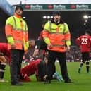 FIRM MESSAGE: From the Premier League in order to tackle the throwing of missiles, pyrotechnics and pitch invasions. Manchester United's Anthony Elanga, centre, was hit by an object in last season's clash at Elland Road. Photo by PAUL ELLIS/AFP via Getty Images.