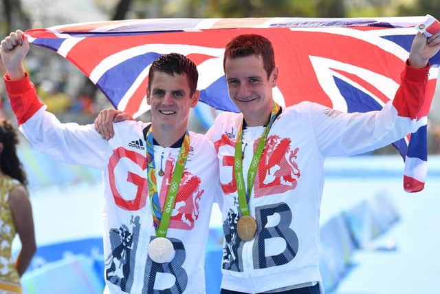 Britain's Alistair Brownlee (R) and Jonathan Brownlee pose with their medals after the men's triathlon at the Rio 2016 Olympic Games Picture: Leon Neal/AFP via Getty Images