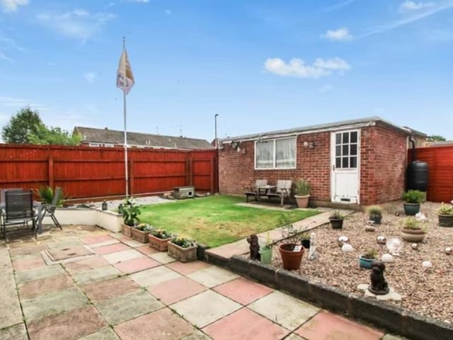 a detached garage provides off street parking.
