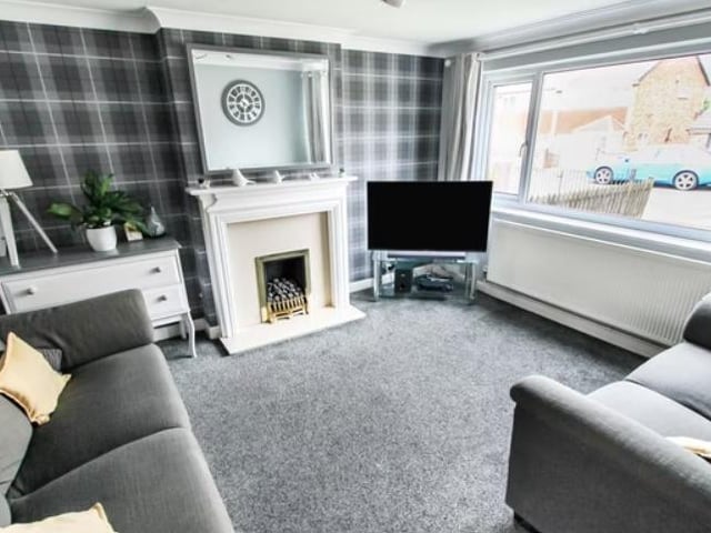 The property comprises of a spacious entrance hall and living room with an under stairs storage cupboard.