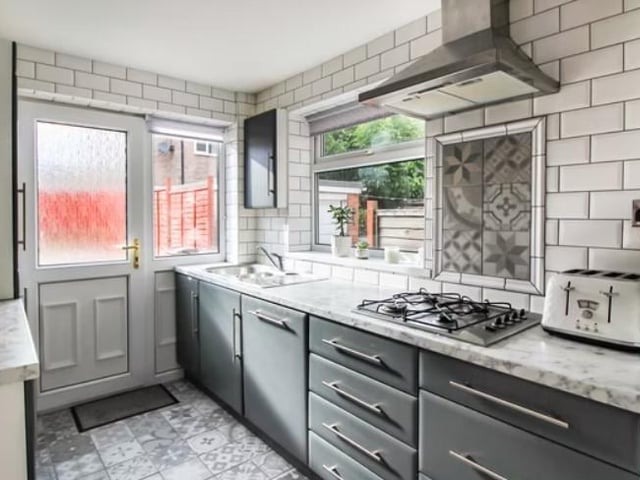 There is also a separate dining room with patio doors and a fully fitted kitchen.