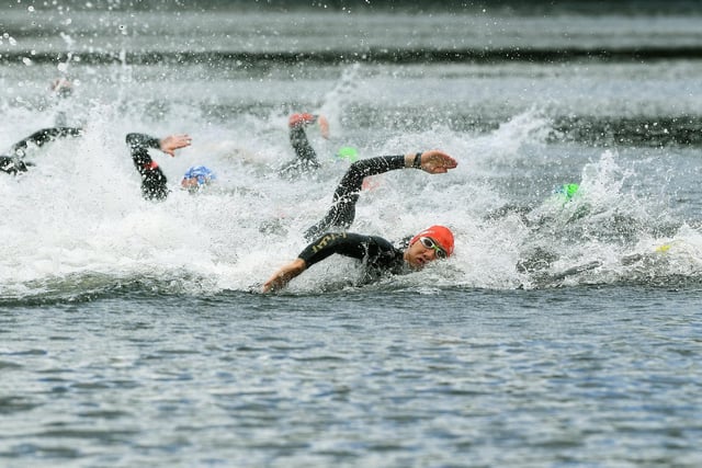 Competitors racing across Waterloo Lake during the swim.