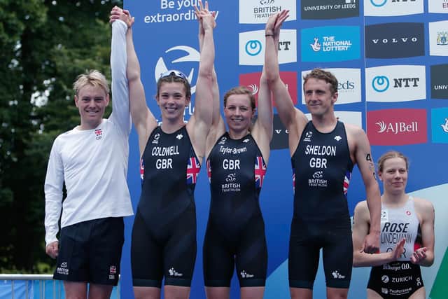 (From left to right) Team GB's Thomas Bishop, Sophie Coldwell, Georgia Taylor-Brown and Grant Sheldon celebrate their podium finish during day one of the 2022 World Triathlon Series event at Roundhay Park, Leeds. (Picture: PA)