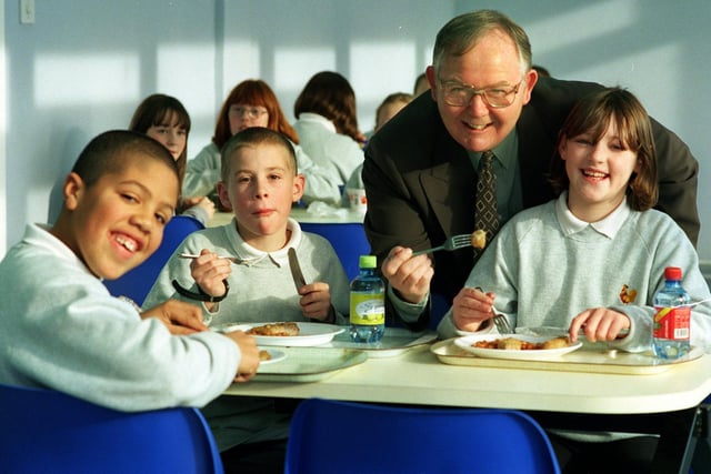 Headteacher Colin Richardson with some Year 7 pupils having lunch in the new dining area in November 1999.