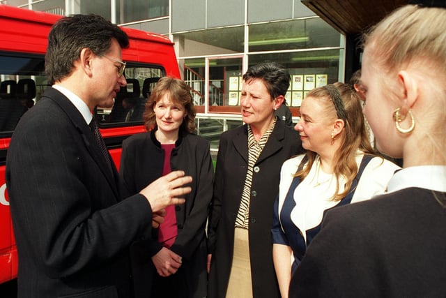 Stephen Byers the Minister for School Standards chats to parents and pupils during a visit in April 1998.
