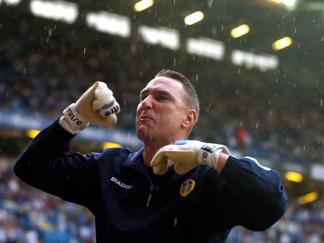 Vinny Jones salutes the Kop at half-time.