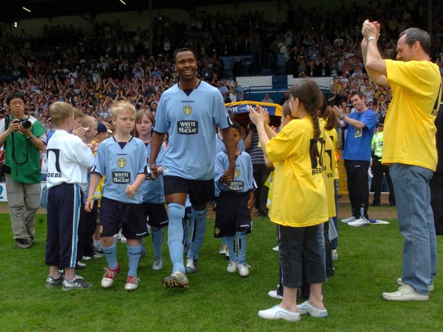 Lucas Radebe leads out the teams