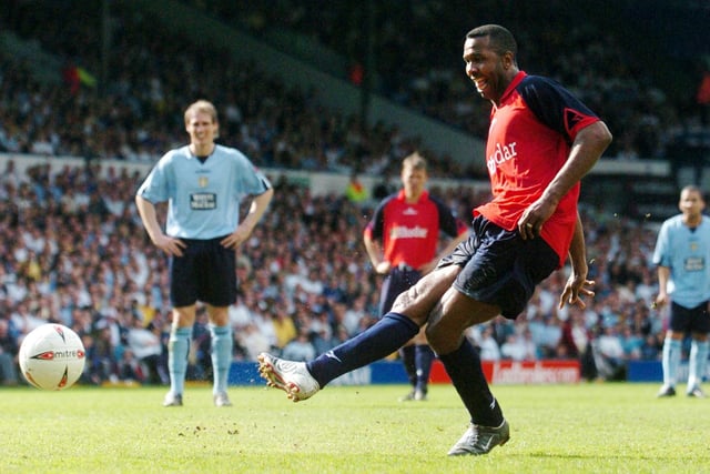 Lucas Radebe scores from the penalty spot.