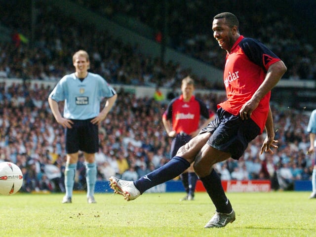 Lucas Radebe scores from the penalty spot.