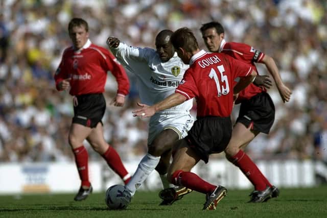 RIVALRY RENEWED: Jimmy Floyd-Hasselbaink looks to evade Richard Gough the last time Leeds United and Nottingham Forest met in the country's top division way back in April 1999. Photo by Tony O''Brien /Allsport via Getty Images.