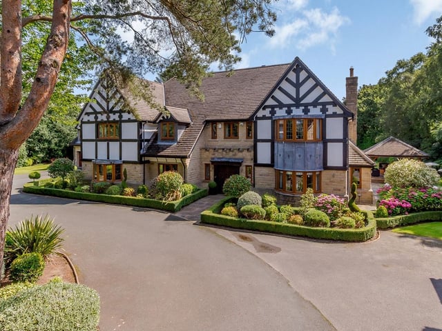The exclusive 10,397 square foot property benefits from a bespoke kitchen, swimming pool, gym, cinema room and stunning landscaped gardens.