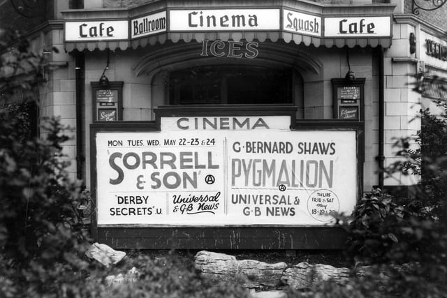 The cinema included a squash court, club, dancing and cafe. A playbill for Sorrell and son and Pygmalion can be seen outside the entrance.