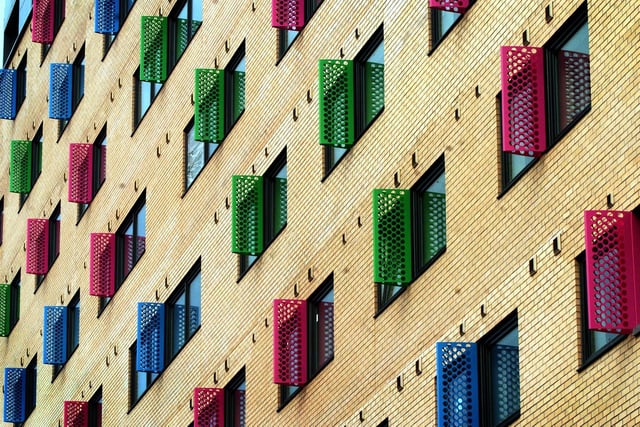 Coloured window blinds on the new Opal One student flats being built off Burley Road in September 2006.