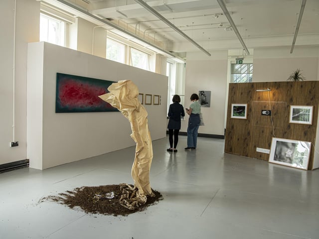 Works by Charlotte Long (front), Aksha Mustafa (back left), and Chase Cifelli (back right).