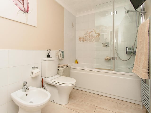 Bath, shower and bidet are included in this bathroom suite.