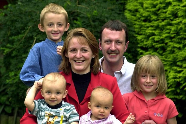 This is Julie Jennings  who worked full time despite having two sets of young twins./ She is pictured with her family, back row, twins Stephen and Hollie and dad Mark. Front row, from left , twins Matthew and Rebecca.