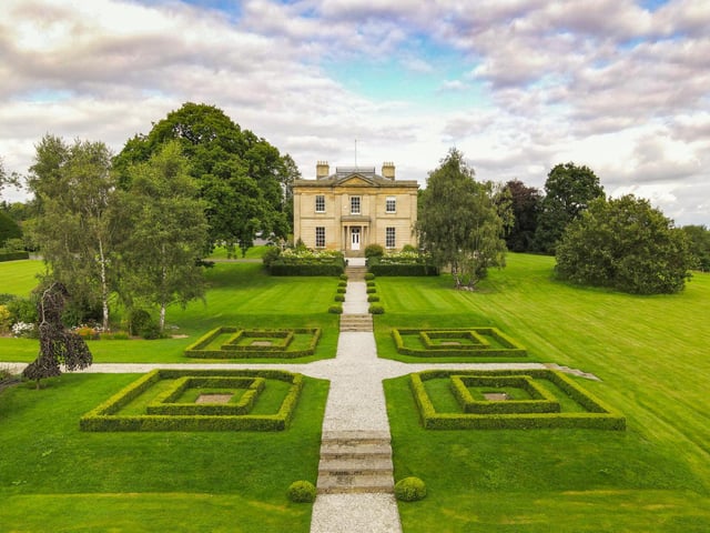 A handsome Grade II listed Georgian manor house, occupying a discrete but commanding elevated position between the villages of Scarcroft and Thorner, is for sale.