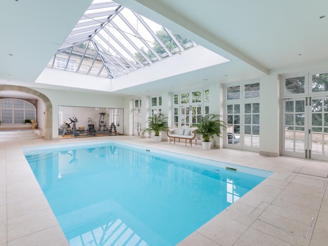A substantial leisure wing resides to the rear of the property incorporating an indoor swimming pool.
