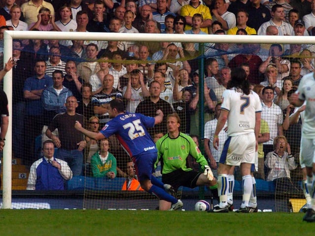 Carlisle United's Grant Smith turns and celebrates after opening the scoring.