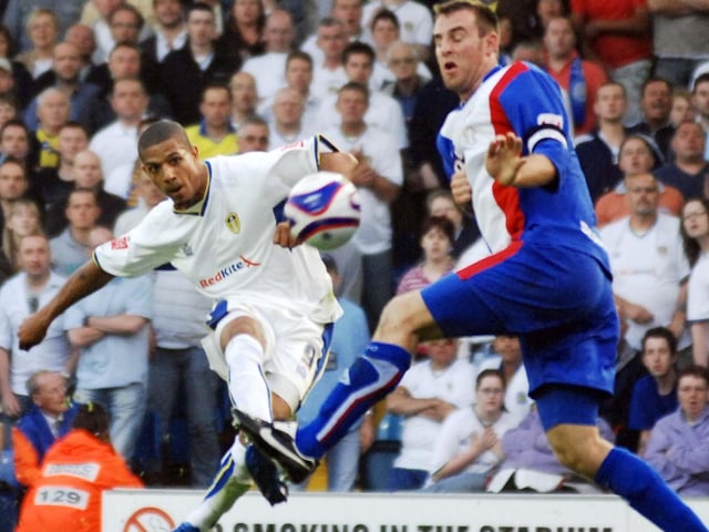Jermaine Beckford fires towards goal.