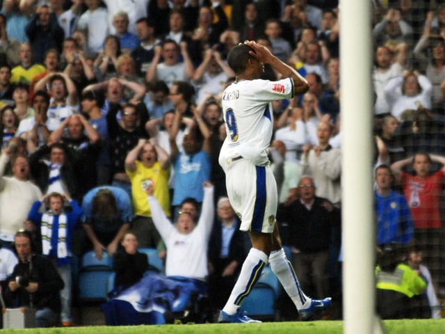 Striker Jermaine Beckford rues a missed chance.