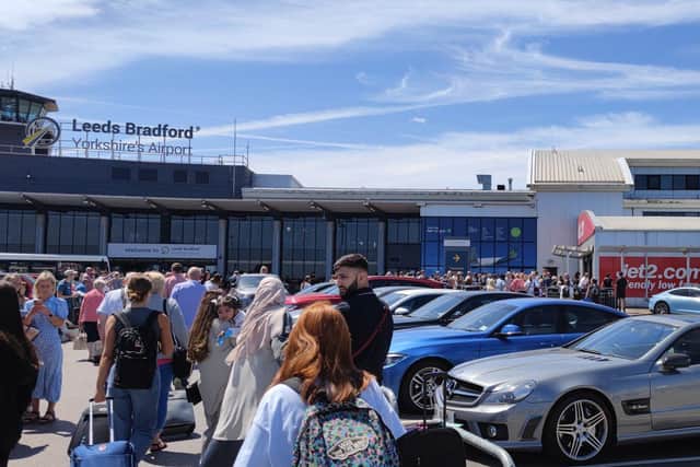Pictures show queues outside Leeds Bradford Airport (Photo: David Fergus)