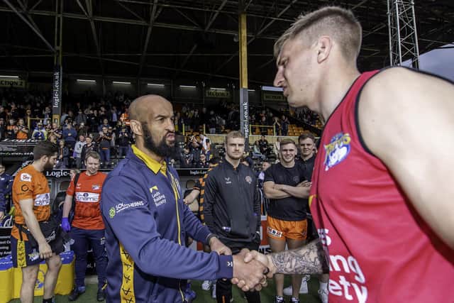 Alex Mellor with then interim-coach Jamie Jones-Buchanan after the defeat at Castleford which proved to be his last game for Leeds. Picture by Allan Mckenzie/SWpix.com.