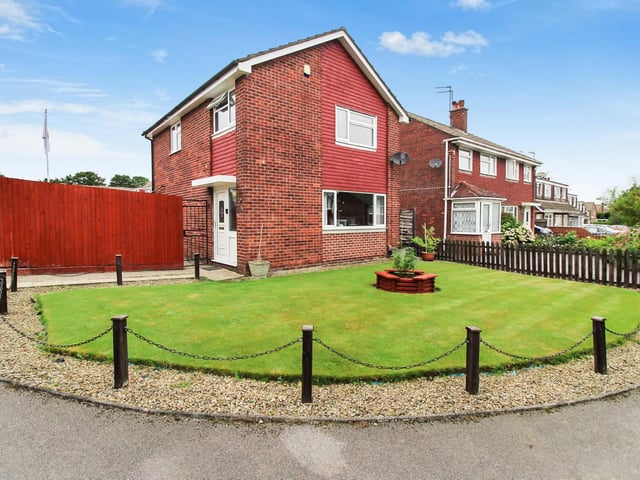 This three bedroom detached house in Whinmoor is on the market for £265,000. Features include two reception rooms, a detached garage and a garden to three sides.