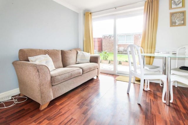 The property comprises of a spacious entrance hall, living room with under stairs storage cupboard, separate dining room with patio doors, fully fitted kitchen, three first floor bedrooms, and a family bathroom.