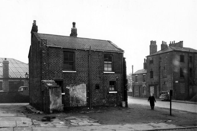 The back Jacob Street, looking north east across Camp Road in March 1956. A man walks towards the camera.