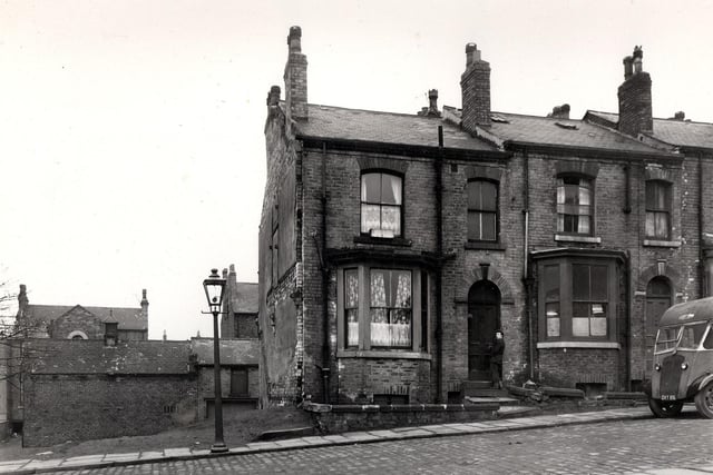 A cleared site where Samuel Street had stood in April 1958. The view looked to Tomlinson Street.