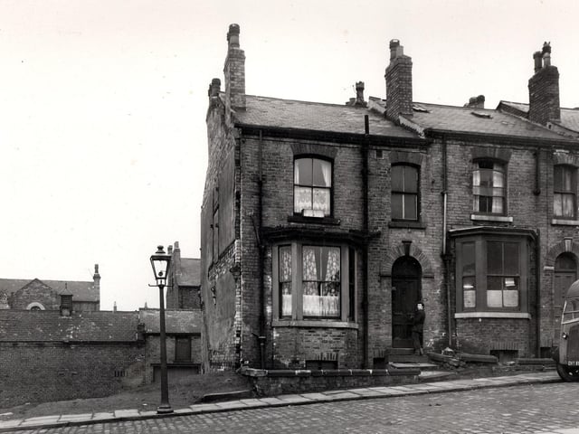 A cleared site where Samuel Street had stood in April 1958. The view looked to Tomlinson Street.