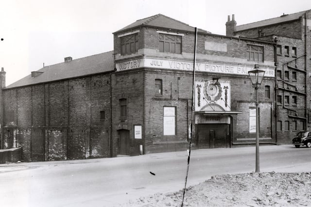 The Victory Cinema on Camp Road pictured in April 1958. The adjacent building to the right was the Victory Halls, at this time it was Sassoons tailoring factoring.