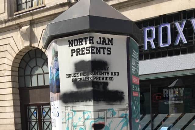 Details of the jam night appear to have been intentionally spray painted over on a poster put up just weeks ago.