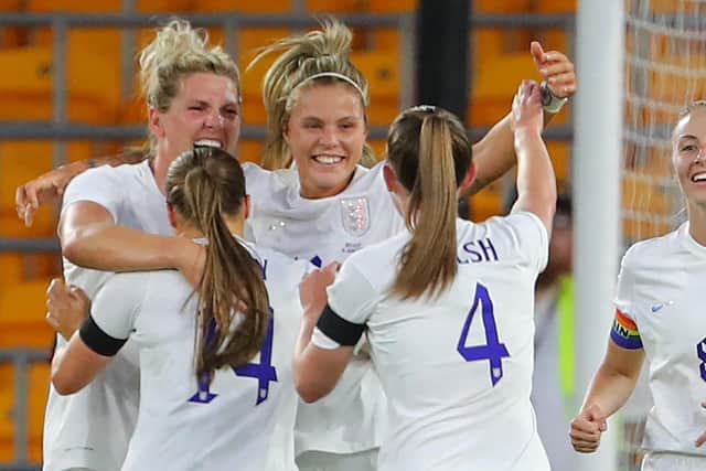 England's defender Rachel Daly (C) celebrates with teammates after scoring their second goal during the Women's International friendly football match between England and Belgium at Molineux (Picture: GEOFF CADDICK/AFP via Getty Images)