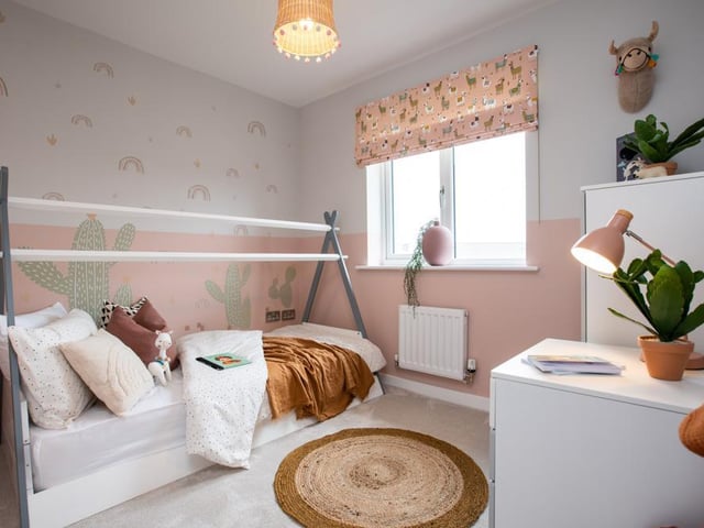 Designed with a family in mind, two of the bedrooms have been created to
showcase rooms for children.