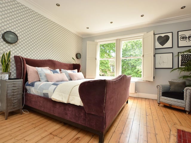 To the first floor are two spacious double bedrooms with beautiful wooden floors.