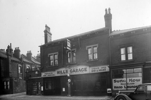 Hill Garage on Roundhay Road pictured in April 1937. The entrance to Back Lascelles Terrace can be seen on left with Sung Kow, High Class Hand Laundry, visible on the right.