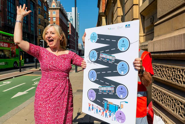 Passengers presented the mayor with a giant bus map showing the eight steps needed to deliver her pledge.