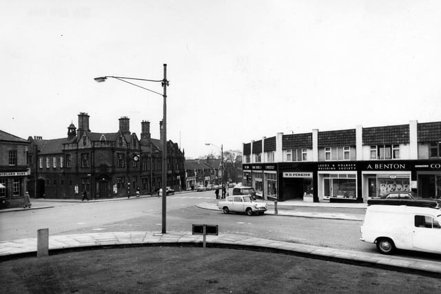 The junction where Harrogate Road, from the left, crosses Stainbeck Lane on the right and Town Street, left in April 1966. On the far left is the Midland Bank, then across the road the Police Station and Chapel Allerton Branch Library. On the right are shops on Stainbeck Corner including W.D. Perkins, Leeds & Holbeck Building Society and A. Benton, footwear.