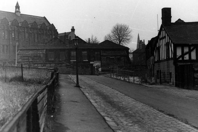 Institution Street in Woodhouse looking west towards Raglan Road. In the background on the left is the March Institute, built around the turn of the 20th century as the Parish Hall of St. Mark's, a gift of the Misses March. Later it became a veneer works but has since been demolished. The area is now taken up with the Holborns.