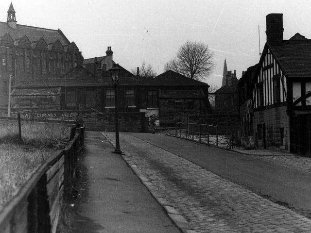 Institution Street in Woodhouse looking west towards Raglan Road. In the background on the left is the March Institute, built around the turn of the 20th century as the Parish Hall of St. Mark's, a gift of the Misses March. Later it became a veneer works but has since been demolished. The area is now taken up with the Holborns.
