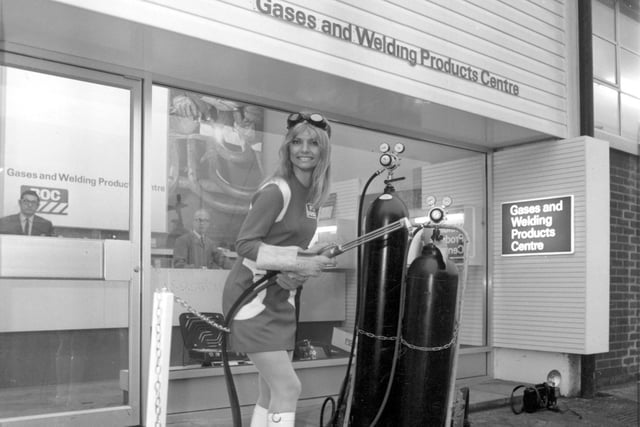Miss BOC Swedish model Ischi Bernell is pictured opening a new welding product centre at the British Oxygen works in Leeds by cutting a chain with a flame cutter in  January 1970.