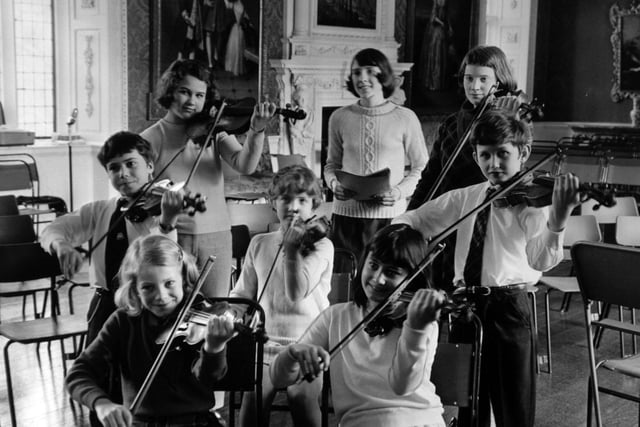 Some of the junior members of the Eta Cohen Orchestra playing at Temple Newsam in April 1970. Pictured, standing from left, are Nigel Gilmore, Alexa Davies, Wendy Mitchell, Pamela Courteney and Neil McDonald. Sitting, from left, are Siriol Jenkins and Nicolle Levine. Behind is Rosamund Kitchen.