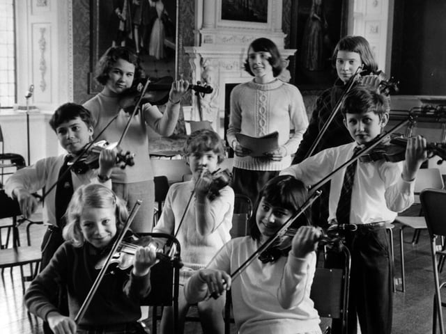 Some of the junior members of the Eta Cohen Orchestra playing at Temple Newsam in April 1970. Pictured, standing from left, are Nigel Gilmore, Alexa Davies, Wendy Mitchell, Pamela Courteney and Neil McDonald. Sitting, from left, are Siriol Jenkins and Nicolle Levine. Behind is Rosamund Kitchen.